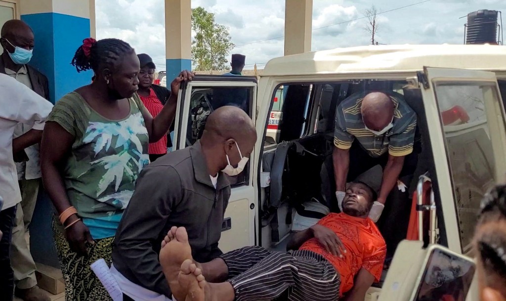 A man is carried from an ambulance as he arrives at Bunia General Referral Hospital following confirmation of an Ebola outbreak involving the Bundibugyo strain in Bunia, Ituri province, Democratic Republic of Congo, May 16, 2026. (Reuters)