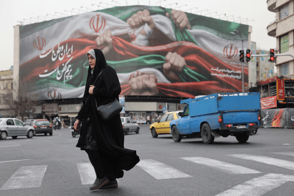 An Iranian woman walks on a street in Tehran, Iran, January 19, 2026. Majid Asgaripour/WANA (West Asia News Agency) via REUTERS