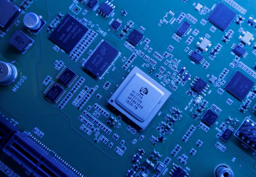 Hi1710 BMC management chip is seen on a Kunpeng 920 chipset designed by Huawei's Hisilicon subsidiary is on display at Huawei's headquarters in Shenzhen, Guangdong province, China May 29, 2019. Picture taken May 29, 2019. REUTERS/Jason Lee