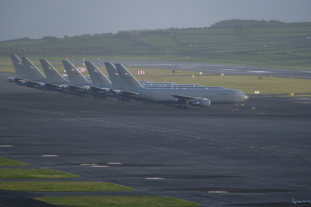 Photo by ANTONIO ARAUJO / AFP  A row of some of the fifteen US Airforce KC-46 Pegasus tankers and one P-8 Poseidon tankers from the US Navy are seen stationed at Lajes Air Base, Praia da Vitória, Terceira island, in the Azores archipielago in the Atlantic Ocean on February 23, 2026.