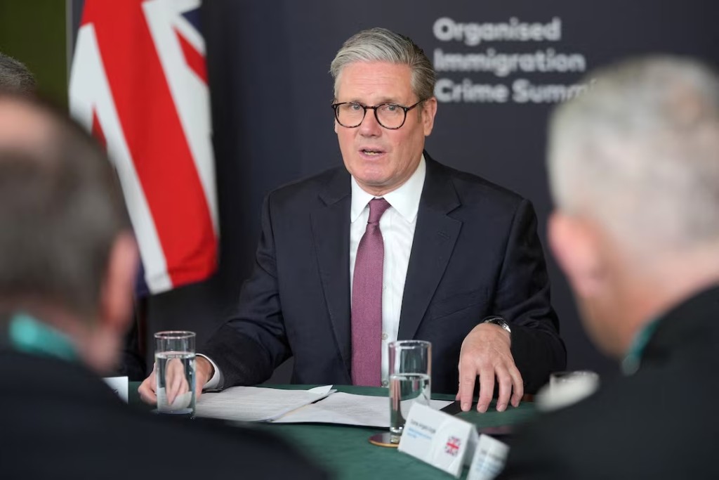 UK plans to end 'failed free market experiment' in immigration