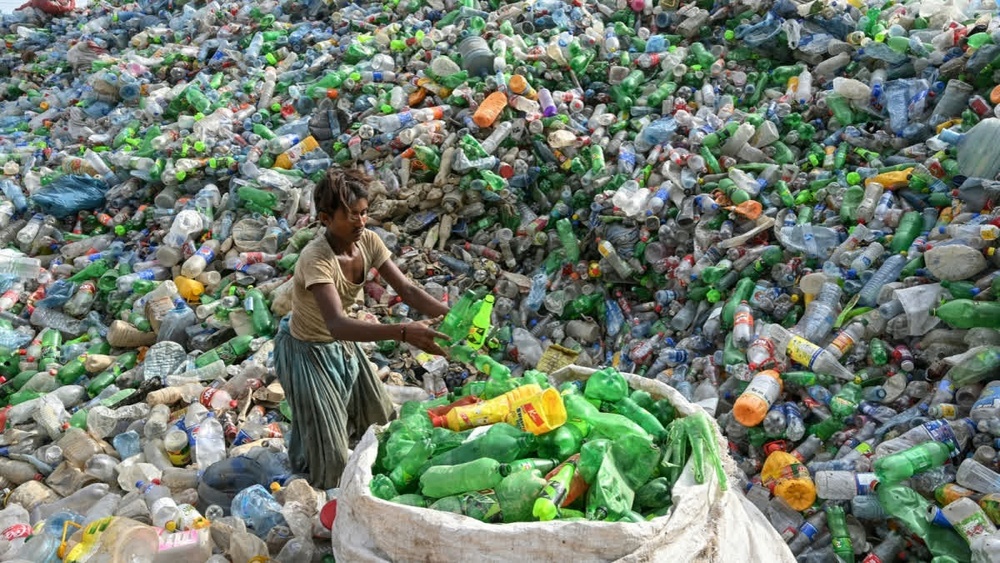 A worker sorts used plastic bottles at a recycling unit in Karachi on September 12, 2024. AFP A worker sorts used plastic bottles at a recycling unit in Karachi on September 12, 2024. AFP