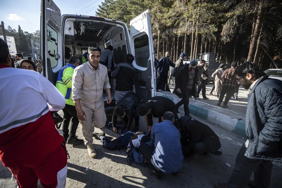 ADDS SOURCE - Injured people get aid after an explosion in Kerman, Iran, Wednesday, Jan. 3, 2024. Iran says the deadly twin bomb blasts occurred at an event honoring a prominent Iranian general slain in a U.S. airstrike in 2020. (Mahdi Karbakhsh Ravari/Mehr News Agnecy via AP)ASSOCIATED PRESS ADDS SOURCE - Injured people get aid after an explosion in Kerman, Iran, Wednesday, Jan. 3, 2024. Iran says the deadly twin bomb blasts occurred at an event honoring a prominent Iranian general slain in a U.S. airstrike in 2020. (Mahdi Karbakhsh Ravari/Mehr News Agnecy via AP)ASSOCIATED PRESS
