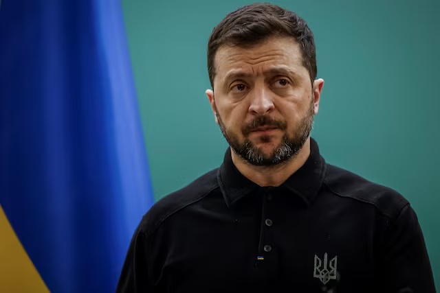 Ukraine’s President Volodymyr Zelenskiy speaks to Ukrainian Muslim service members before sharing an iftar with them, a meal to break their fast at sunset, during the holy month of Ramadan, in a mosque in Kyiv, Ukraine March 13, 2025. REUTERS/Alina Smutko/File Photo 
