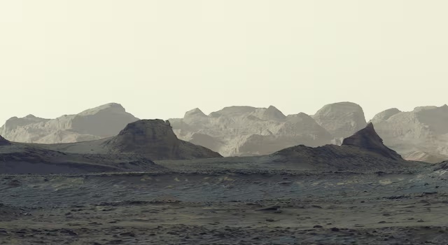 A view of the Martian surface taken by NASA's Curiosity on August 11, 2026, showing wind-carved crags called yardangs on Mount Sharp, which rises from Gale Crater near the planet's equator. The photograph is a zoomed-in crop of a broader panorama captured by the rover. NASA/JPL-Caltech/MSSS/Handout via REUTERS