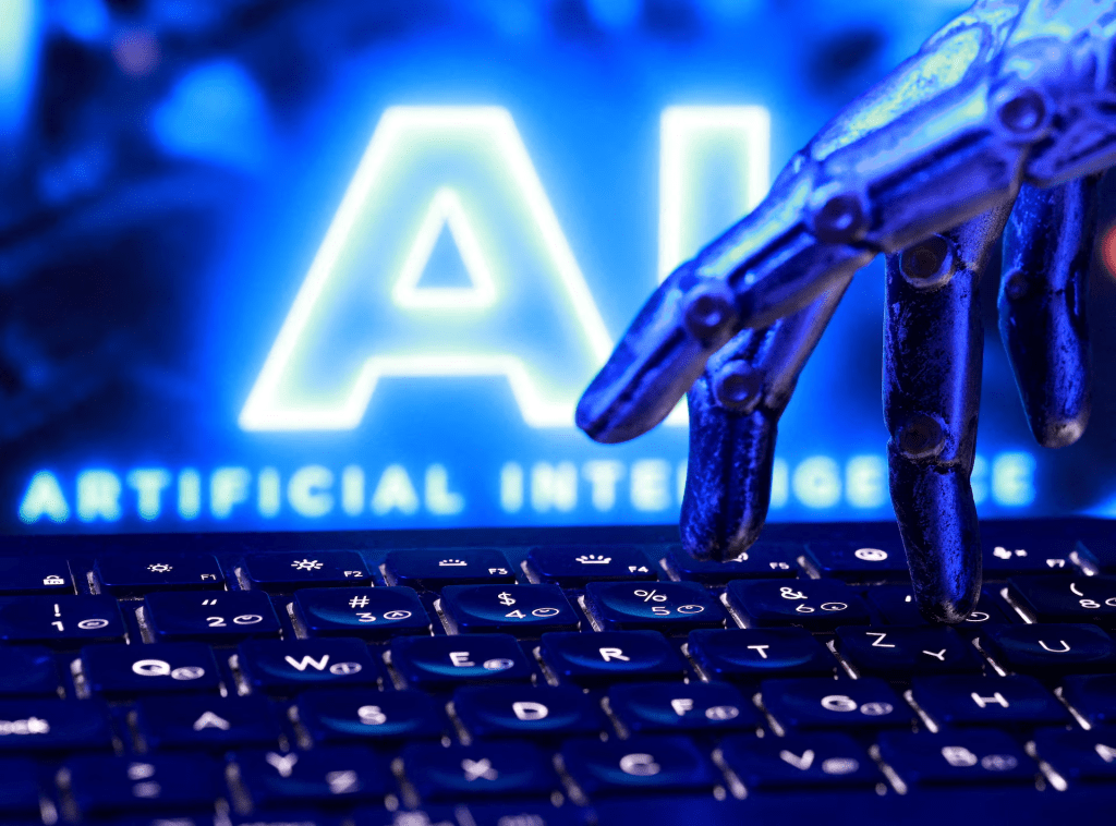 "AI Artificial Intelligence" words, a keyboard and a robotics hand in this illustration taken, September 23, 2026. REUTERS/Dado Ruvic/Illustration/File Photo
