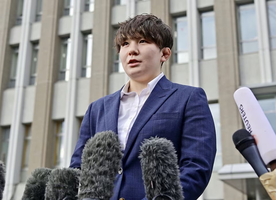 Rina Gonoi, a former member of Japan Self-Defense Forces, who has accused colleagues of sexually assaulting her during her time in the military, speaks to the media at the Fukushima District Court in Fukushima, Japan December 12, 2023, in this photo taken by Kyodo. Mandatory credit Kyodo/via REUTERS 