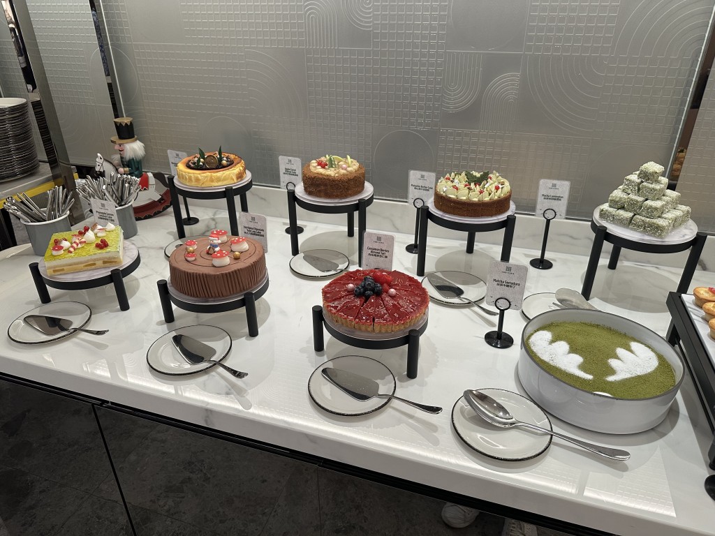 Assorted whole cake selection.