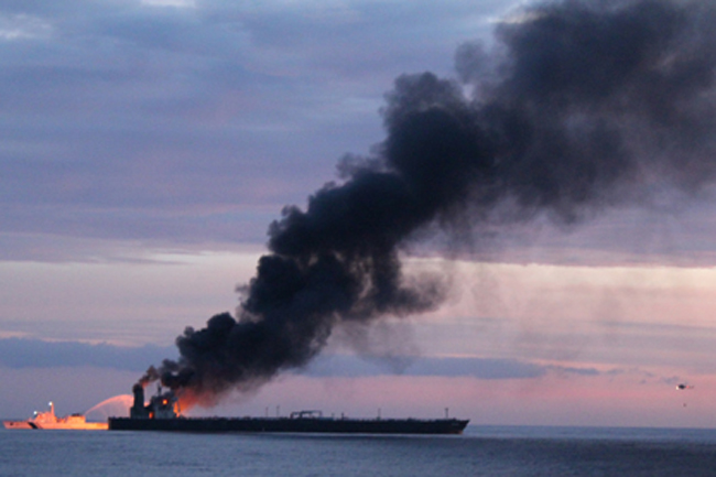 An eging Indian Oil Corp crude carrier on fire off the pristine eastern coastline of Sri Lanka. An eging Indian Oil Corp crude carrier on fire off the pristine eastern coastline of Sri Lanka.