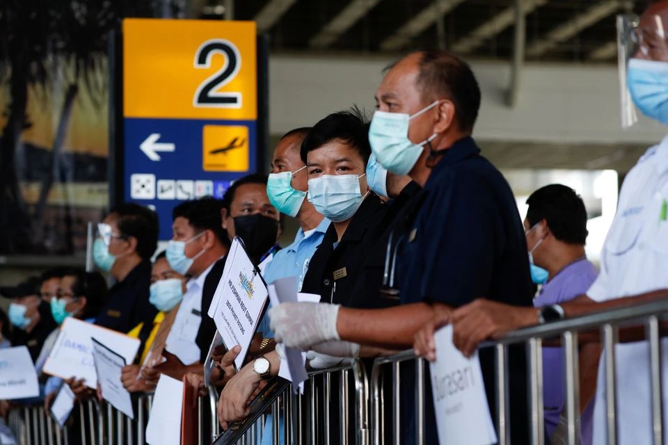 Hotel drivers wait for passengers at the airport, as Phuket reopens to overseas tourists, allowing foreigners fully vaccinated against the coronavirus disease to visit the resort island without quarantine, in Phuket, Thailand July 1, 2021. Hotel drivers wait for passengers at the airport, as Phuket reopens to overseas tourists, allowing foreigners fully vaccinated against the coronavirus disease to visit the resort island without quarantine, in Phuket, Thailand July 1, 2021.