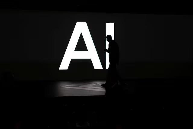 A screen reads 'AI' in reference to artificial intelligence, in Palo Alto, California, U.S., December 11, 2025. REUTERS/Carlos Barria