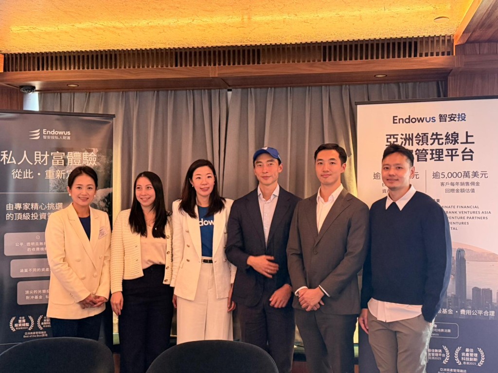 Gregory Van, co-founder and chief executive of Endowus (third from the right), Endowus Hong Kong's managing director and head of Hong Kong, Steffanie Yuen (third from the left) and Endowus Hong Kong's investment advisory director Jasmine Chan (first from the left).