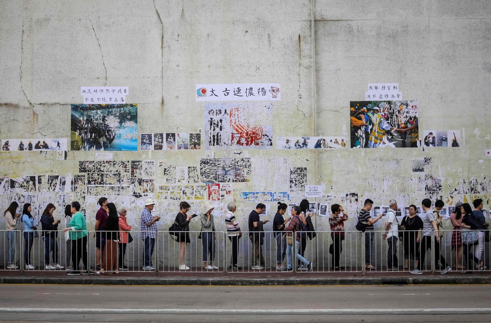 Voters queue during the district council election in 2019. Voters queue during the district council election in 2019.