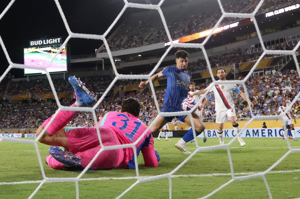 Al Hilal's Marcos Leonardo scores their fourth goal past Manchester City's Ederson. (Reuters)