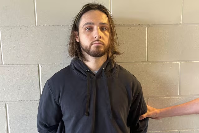 Jonathan Rinderknecht, 29, is posed after his arrest on charges that he intentionally ignited the Pacific Palisades Fire in Los Angeles, before his first court appearance in Orlando, Florida, U.S. October 8, 2025. Department of Justice/Handout via REUTERS