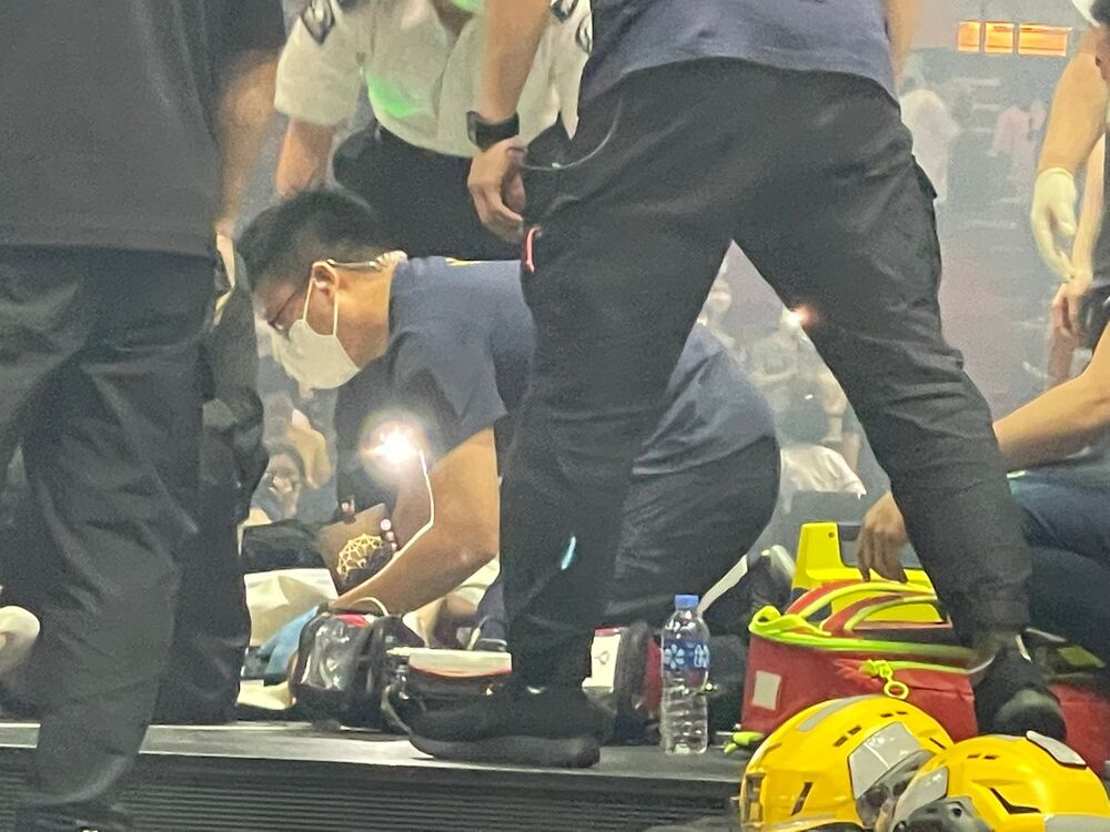 Injured dancers being attended to by local paramedics. (Sing Tao/File) 