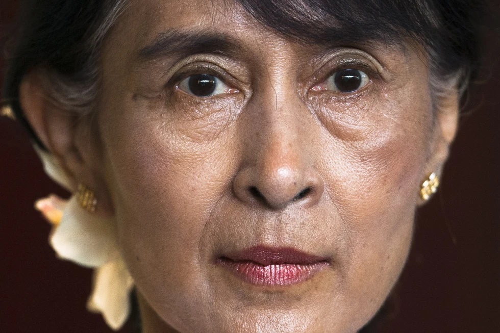 In this June 15, 2012, file photo, Myanmar opposition leader Aung San Suu Kyi briefs the media after a meeting with Norway Prime Minister Jens Stoltenberg at the Norway government guest house in Oslo. (AP Photo/Markus Schreiber, File)