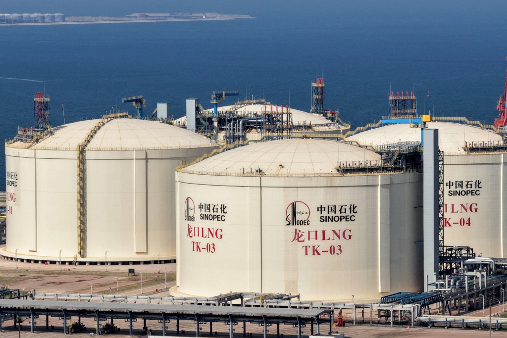 Tanks are seen at a Sinopec Company oil and LNG storage and transportation base in Longkou, Shandong province, eastern China, on August 2, 2026. (Photo by CN-STR / AFP) / China OUT