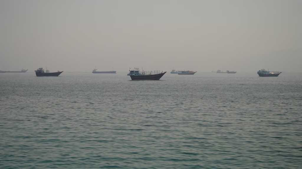Vessels are anchored in the Strait of Hormuz, as seen from Musandam, Oman, June 11, 2026. REUTERS/Stringer 