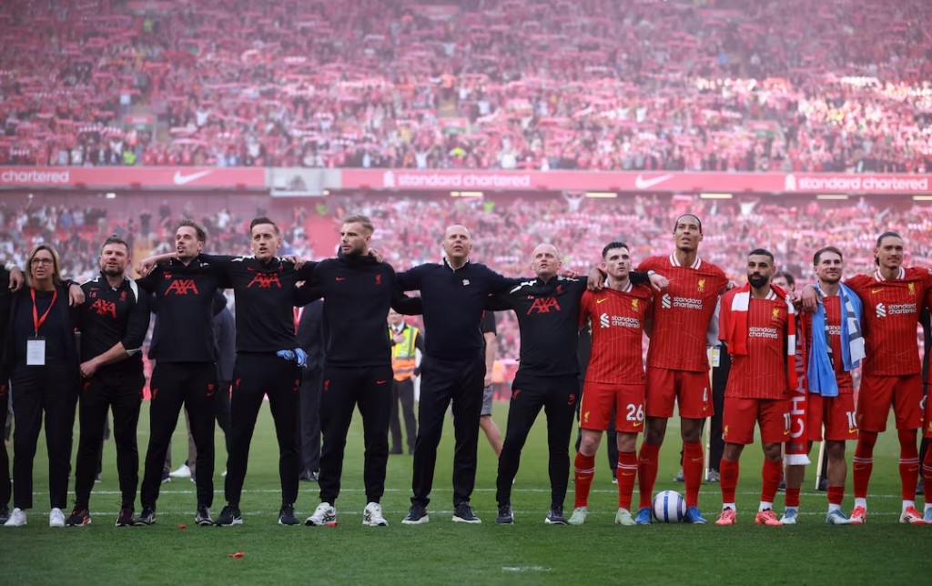 Liverpool manager Arne Slot and players celebrate after winning the Premier League. (Reuters)