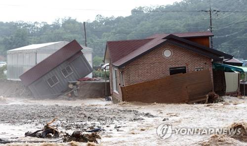 A house in Chungju, North Chungcheong province, is destroyed by heavy rains on Sunday. A house in Chungju, North Chungcheong province, is destroyed by heavy rains on Sunday.