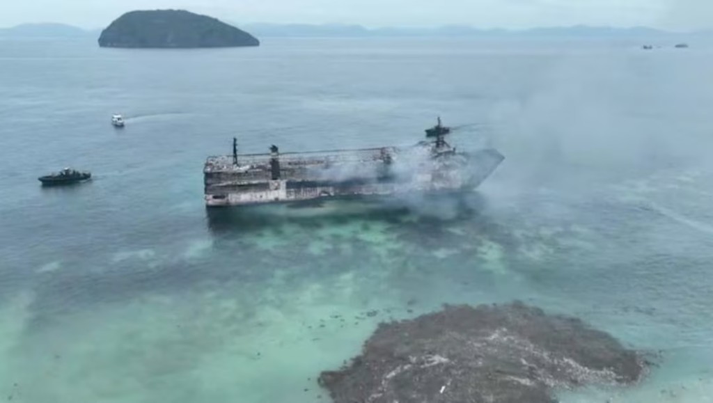A drone view shows burned MV June Aster, after a fire broke out on the ferry, off the coast of Palawan, Philippines, September 10, 2026, in this screengrab obtained from a video. PHILIPPINE COAST GUARD/Handout via REUTERS