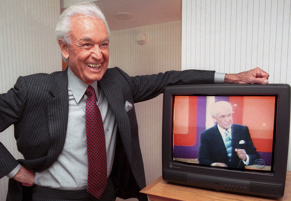 Legendary game show host Bob Barker, 73, leans on his hotel room television showing his image, during an interview Monday, Oct. 23, 2000 in Cambridge, Mass. (AP Photo/Michael Dwyer) Legendary game show host Bob Barker, 73, leans on his hotel room television showing his image, during an interview Monday, Oct. 23, 2000 in Cambridge, Mass. (AP Photo/Michael Dwyer)