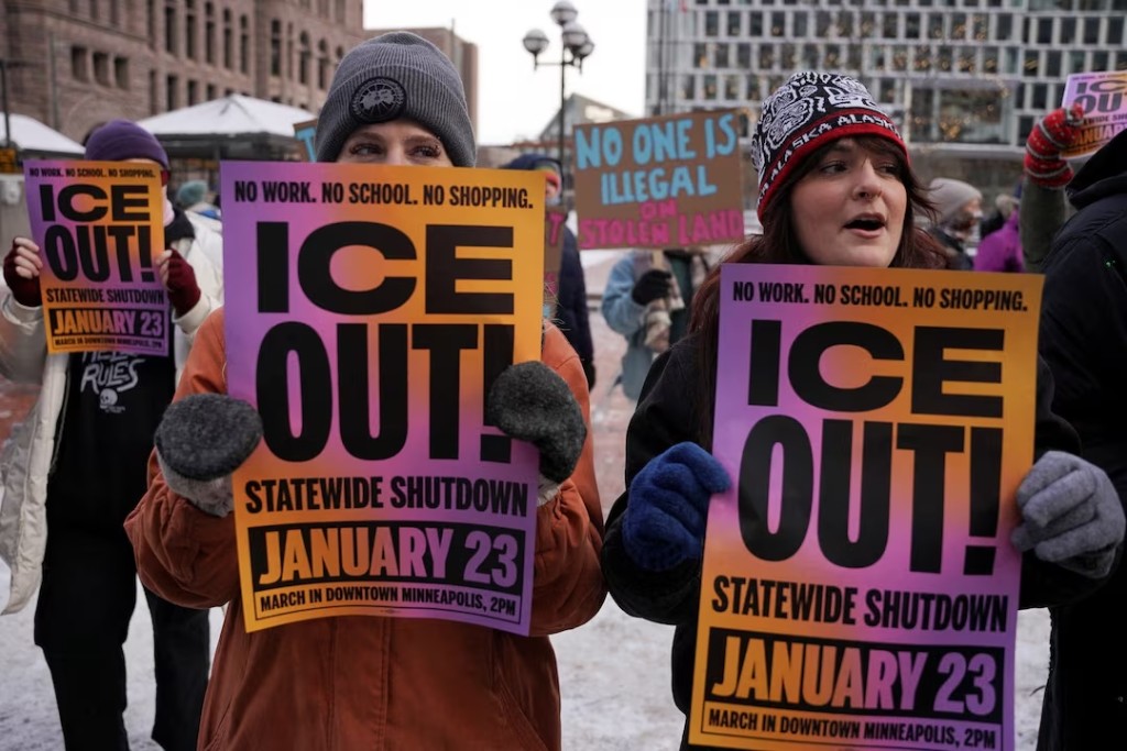 Demonstrators take part in a anti-ICE protest, after a U.S. Immigration and Customs Enforcement (ICE) agent fatally shot Renee Nicole Good on January 7 during an immigration raid, in Minneapolis, Minnesota, U.S., January 20, 2026. REUTERS/Seth Herald/File Photo