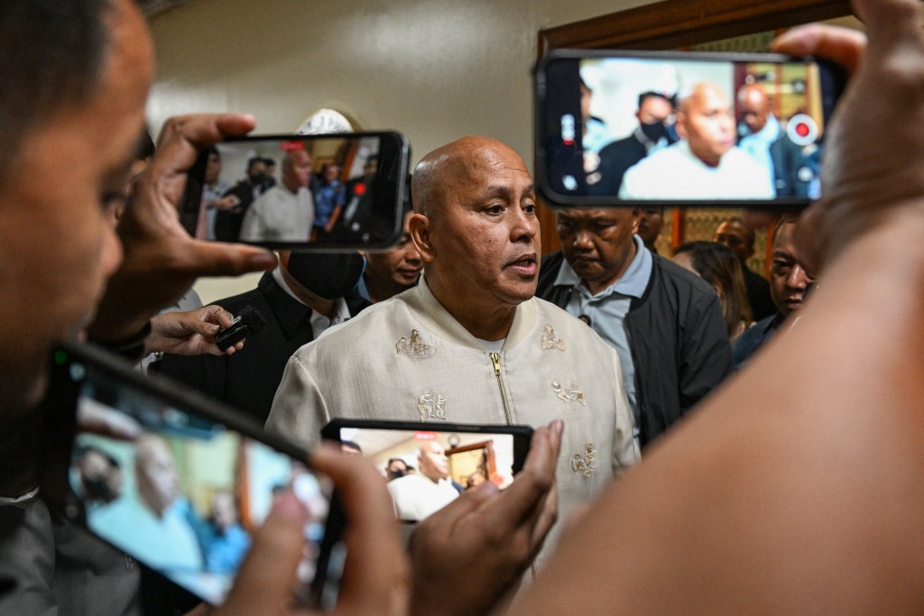 Photo by JAM STA ROSA / AFP  Philippine Senator Ronald Dela Rosa talks to the media during a doorstop interview at the Senate of the Philippines in Pasay, Metro Manila on May 12, 2026.