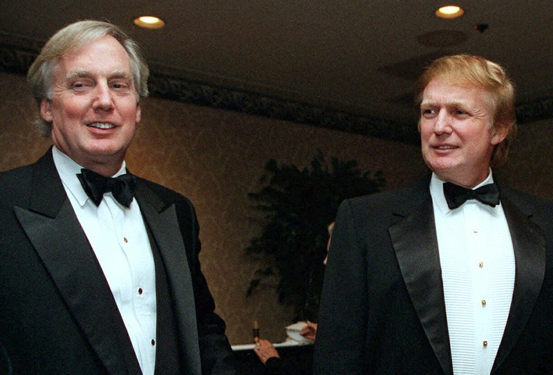 In this Nov. 3, 1999, file photo, Robert Trump, left, joins then real estate developer and presidential hopeful Donald Trump at an event in New York. In this Nov. 3, 1999, file photo, Robert Trump, left, joins then real estate developer and presidential hopeful Donald Trump at an event in New York.