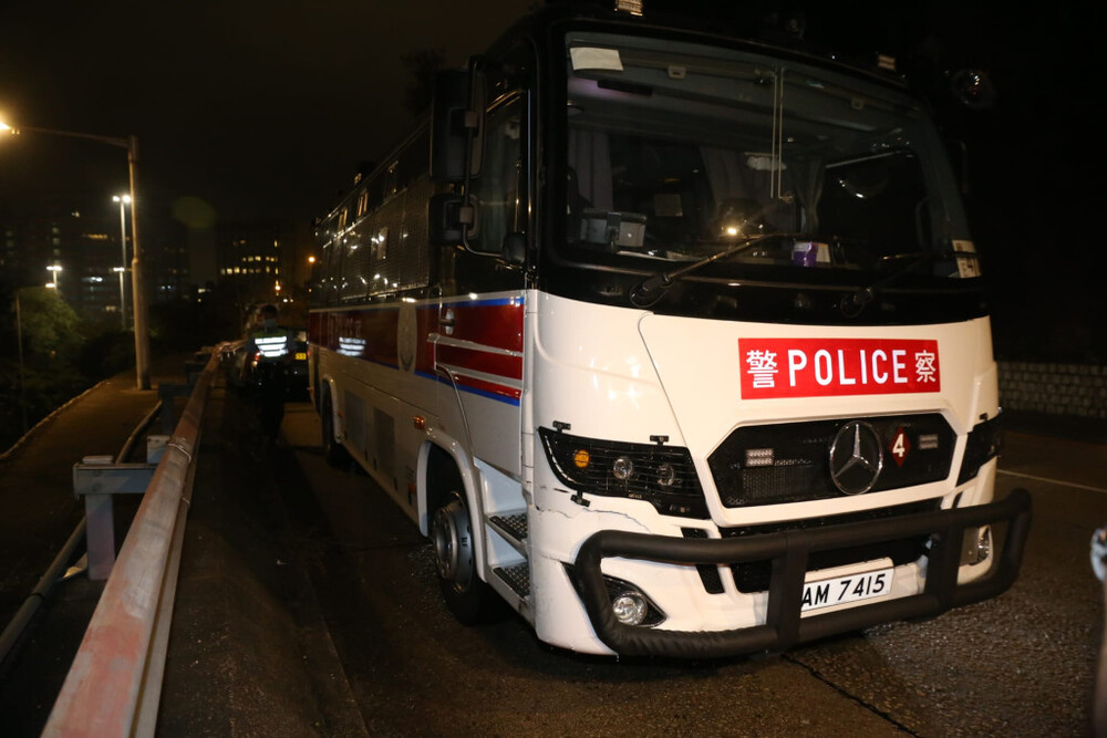 A tactical coach of the police force on Sunday night collided with a private car carrying the founder of the city’s largest property agency.