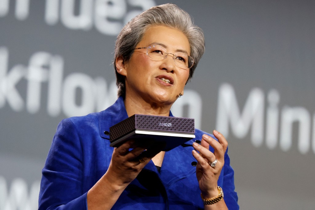 Lisa Su, chair and chief executive officer of Advanced Micro Devices Inc. (AMD), holds up the AMD Ryzen AI Halo, an AI developer platform, during an AMD news conference ahead of the annual Consumer Electronics Show in Las Vegas, Nevada, on January 5, 2026. AFP