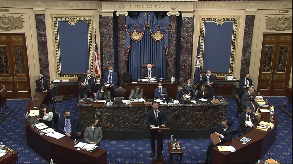 In this image from video, House impeachment manager Representative Eric Swalwell, of California, speaks during the second impeachment trial of former President Donald Trump in the Senate at the U.S. Capitol in Washington, Wednesday, February 10, 2021. In this image from video, House impeachment manager Representative Eric Swalwell, of California, speaks during the second impeachment trial of former President Donald Trump in the Senate at the U.S. Capitol in Washington, Wednesday, February 10, 2021.