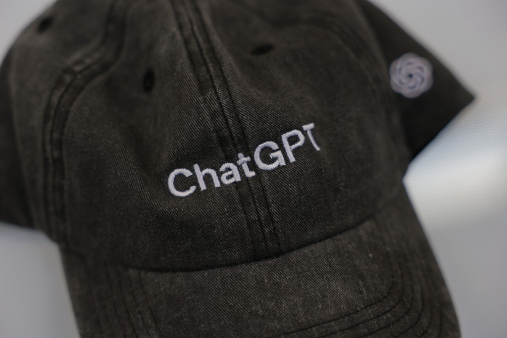 An Open AI ChatGPT hat is on display at an OpenAI developers conference at Fort Mason on September 29, 2026 in San Francisco, California. Open AI CEO Sam Altman announced new artificial intelligence personal assistant agents named "dots" to rival Meta's Muse. Heather Diehl/Getty Images/AFP