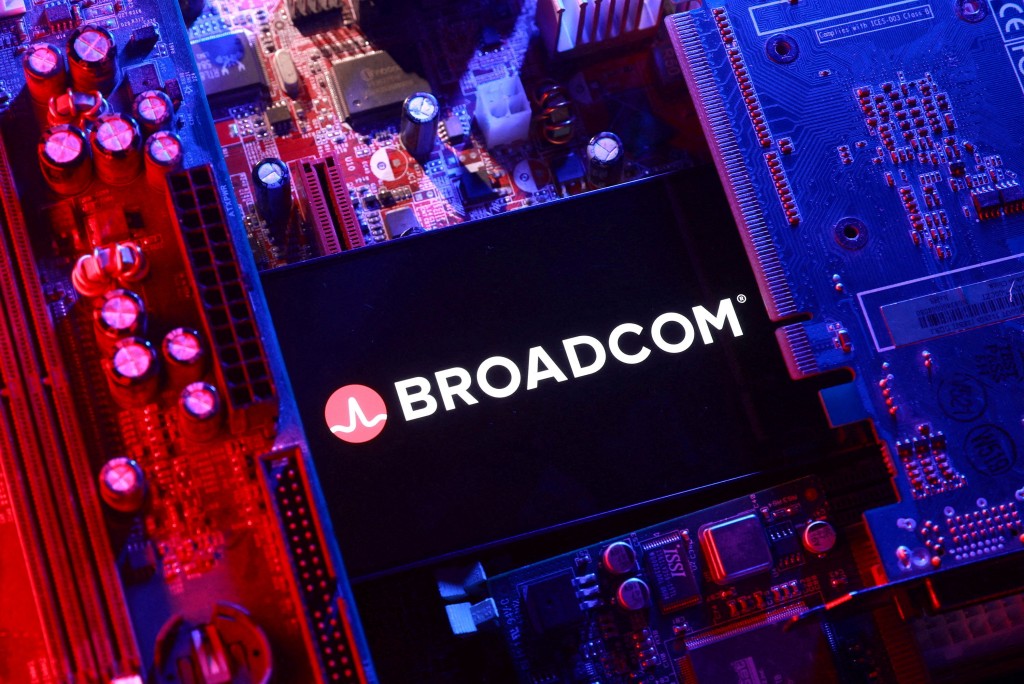 A Broadcom logo and a computer motherboard appear in this illustration created on August 25, 2025. REUTERS/Dado Ruvic/Illustration