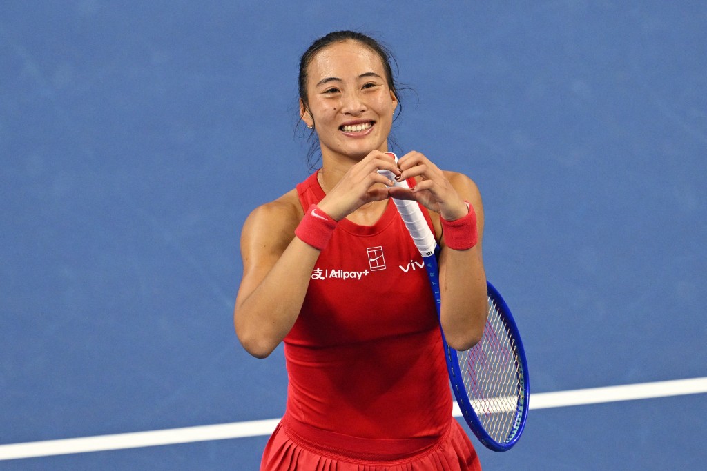 China’s Zheng Qinwen gestures to the crowd after beating Russia’s Mirra Andreeva in the women’s singles final at the China Open tennis tournament in Beijing on October 11, 2026. (AFP)