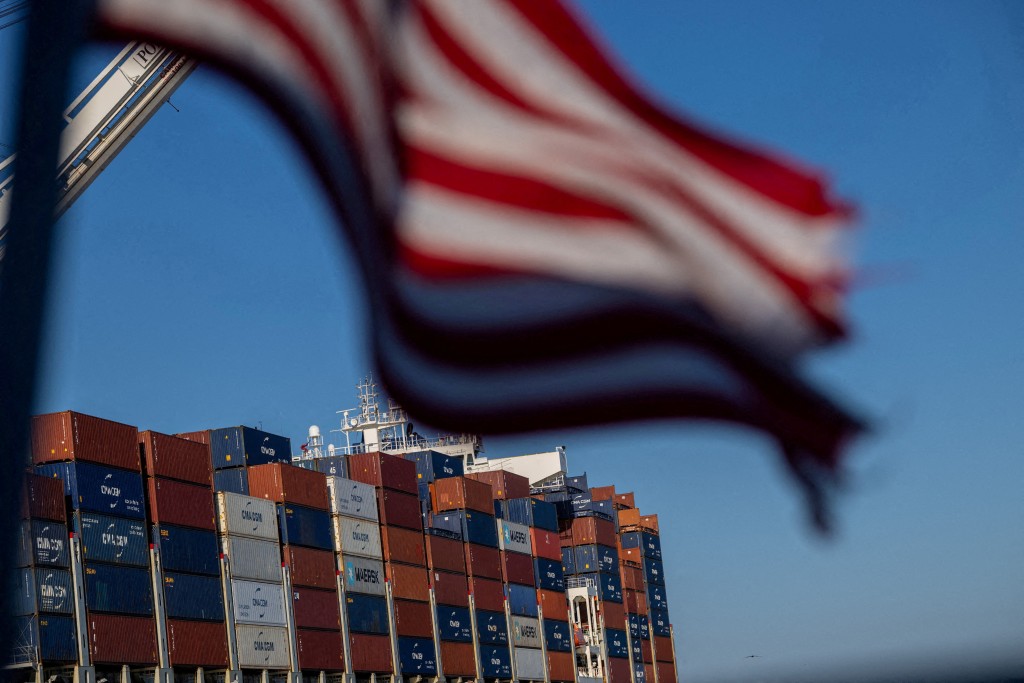 A cargo ship full of shipping containers is seen at the port of Oakland, California, U.S., August 4, 2025. REUTERS/Carlos Barria