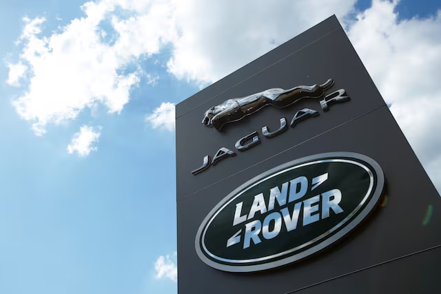 The Jaguar Land Rover logo is seen at a dealership, following the outbreak of the coronavirus disease (COVID-19), Milton Keynes, Britain, June 1, 2020. REUTERS/Andrew Boyers/File Photo 