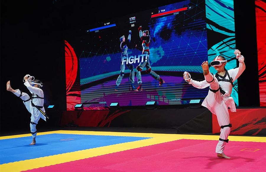 Athletes compete at the inaugural World Taekwondo Virtual Championships in Singapore, on Nov.17, 2024. (Xinhua)