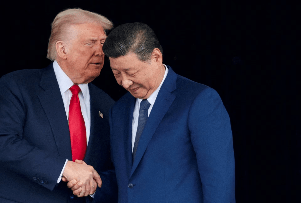U.S. President Donald Trump and Chinese President Xi Jinping talk as they leave after a bilateral meeting at Gimhae International Airport, on the sidelines of the Asia-Pacific Economic Cooperation (APEC) summit, in Busan, South Korea, October 30, 2025. REUTERS/Evelyn Hockstein/File Photo