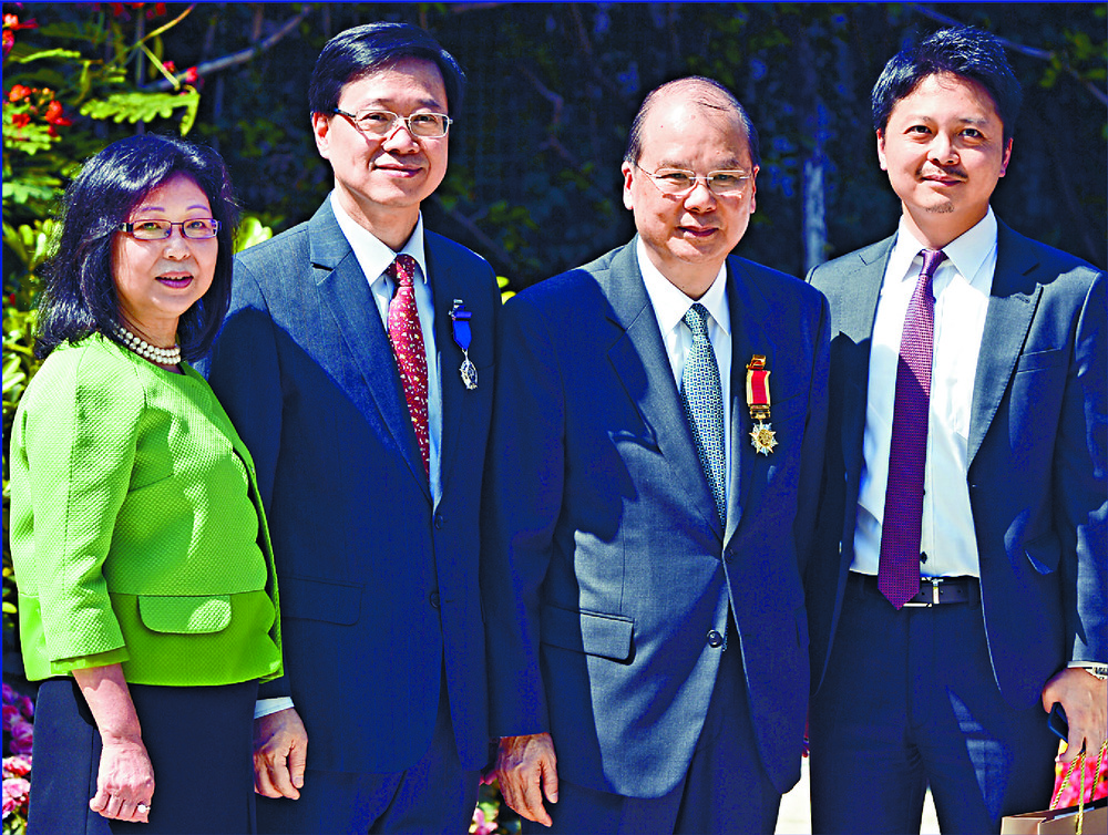 John Lee, second left, is seen with wife Janet Lam, former chief secretary Matthew Cheung and Gilbert Lee. Inset: Jacky Lee. John Lee, second left, is seen with wife Janet Lam, former chief secretary Matthew Cheung and Gilbert Lee. Inset: Jacky Lee.