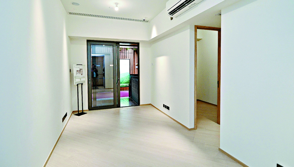 THREE BEDROOMS: Unit B1 is spacious and airy with large windows and a balcony.