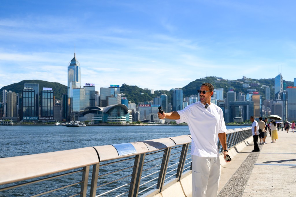 Rio Ferdinand took a stroll along the Victoria Harbor promenade.