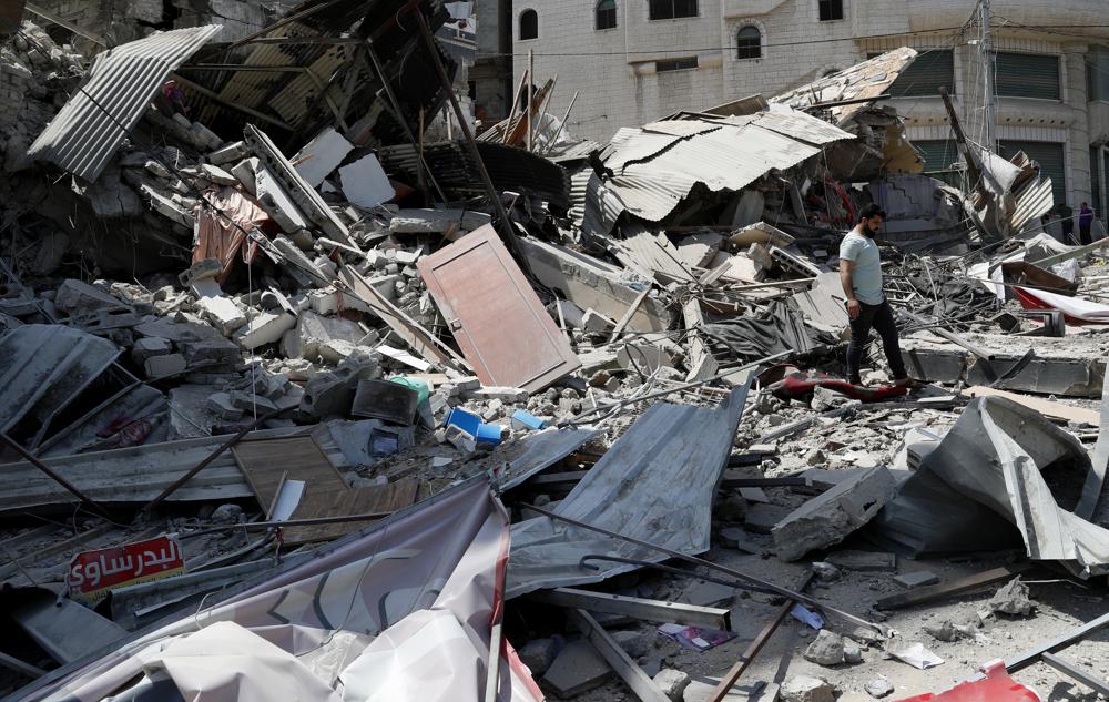 A destroyed residential building which was hit by Israeli airstrikes, in Gaza City, Thursday, May 20, 2021. A destroyed residential building which was hit by Israeli airstrikes, in Gaza City, Thursday, May 20, 2021.