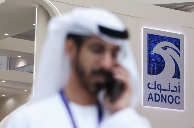A logo of ADNOC is displayed at the Make it in the Emirates (MIITE) conference, in Abu Dhabi, United Arab Emirates, May 4, 2026. REUTERS/Amr Alfiky