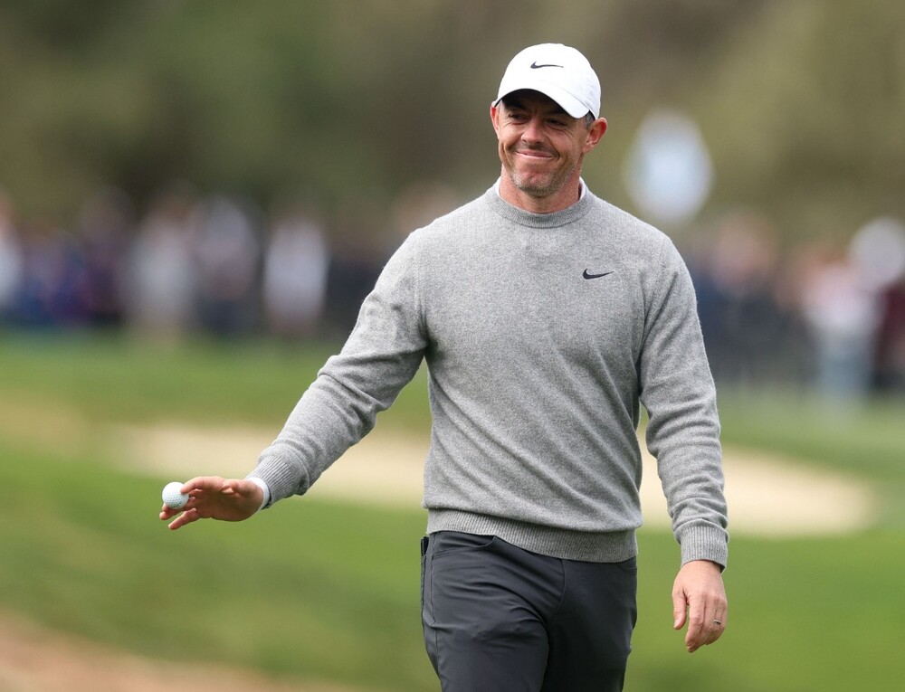 Rory McIlroy acknowledges the crowd after making a hole-in-one. AFP Rory McIlroy acknowledges the crowd after making a hole-in-one. AFP