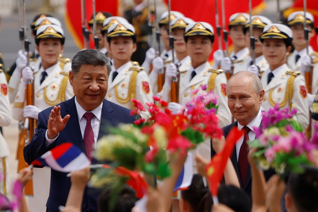 Russian President Vladimir Putin and Chinese President Xi Jinping attend a welcoming ceremony at the Great Hall of the People in Beijing, China May 20, 2026. (Reuters)