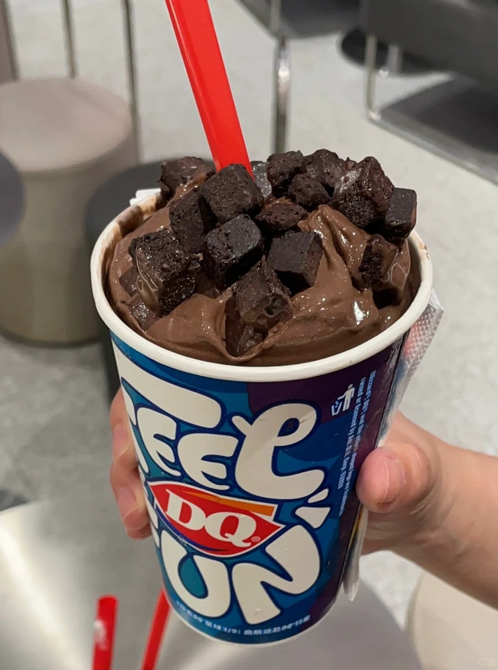 The soft serve is blended with toppings such as mango sauce and cookie crumbs.