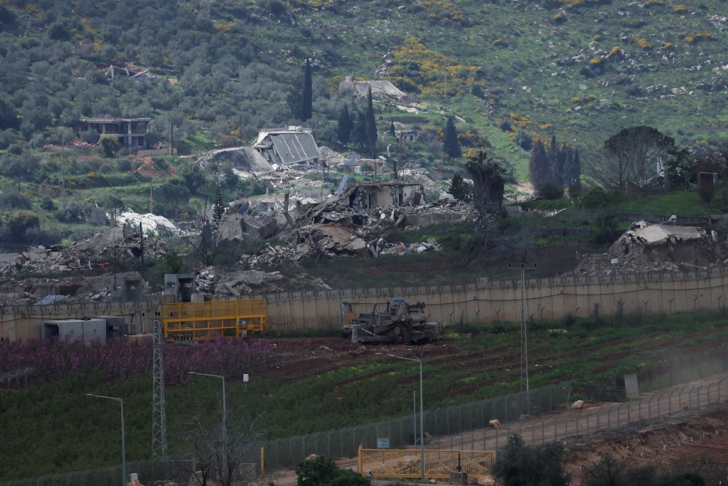 Damaged buildings at Kafr Kila following Israeli army activity across the border between Israel and Lebanon, as seen from Metula on the Israeli side of the border, April 9, 2026. (Reuters)