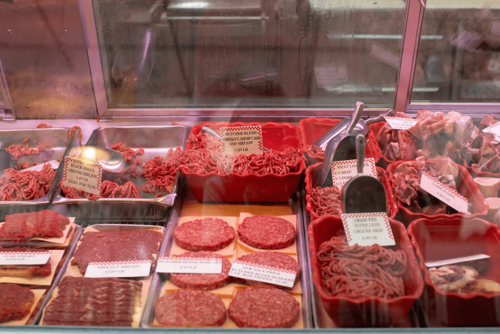 Several ground beef options are displayed in a butcher’s case at Eastern Market in Washington, U.S., August 14, 2024. REUTERS/Kaylee Greenlee Beal/File Photo